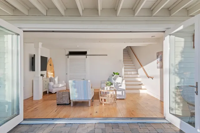 a living room with furniture and a table