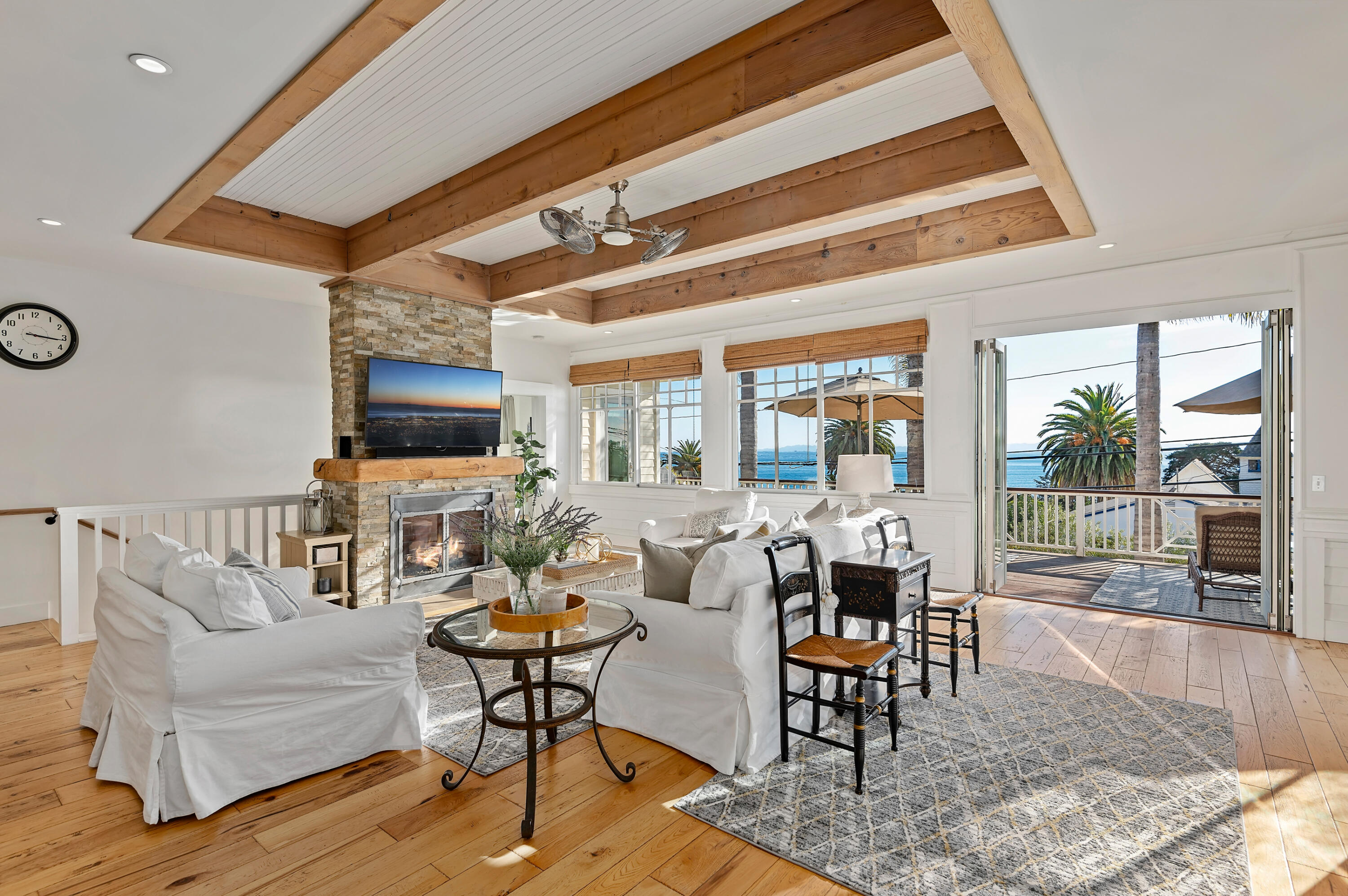 Undisclosed Address Summerland, CA 93067 - Photo 5 of 27 a living room with furniture a rug and a floor to ceiling window