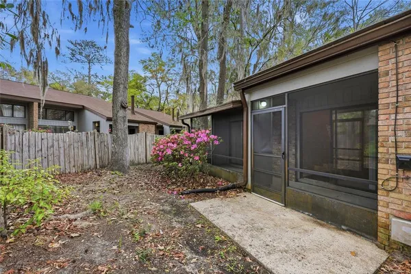 a house view with a backyard space