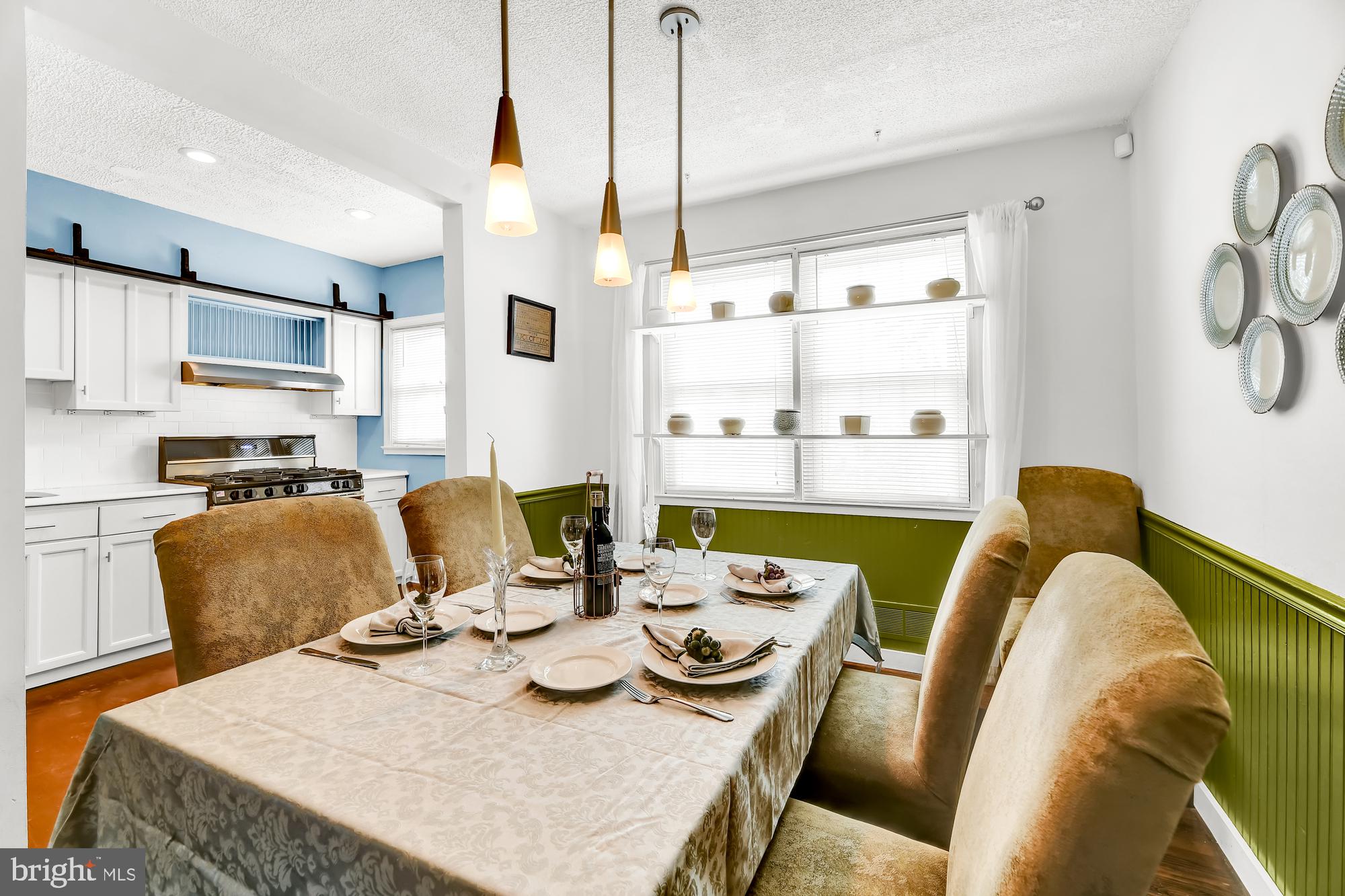 8339 Ridgely Oak Road Baltimore, MD 21234 - Photo 9 of 34 D/R with Pendant Lights, Hardwood, Adjoins Kitchen