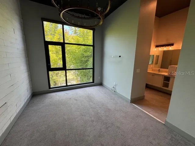 a bathroom with a sink and mirror