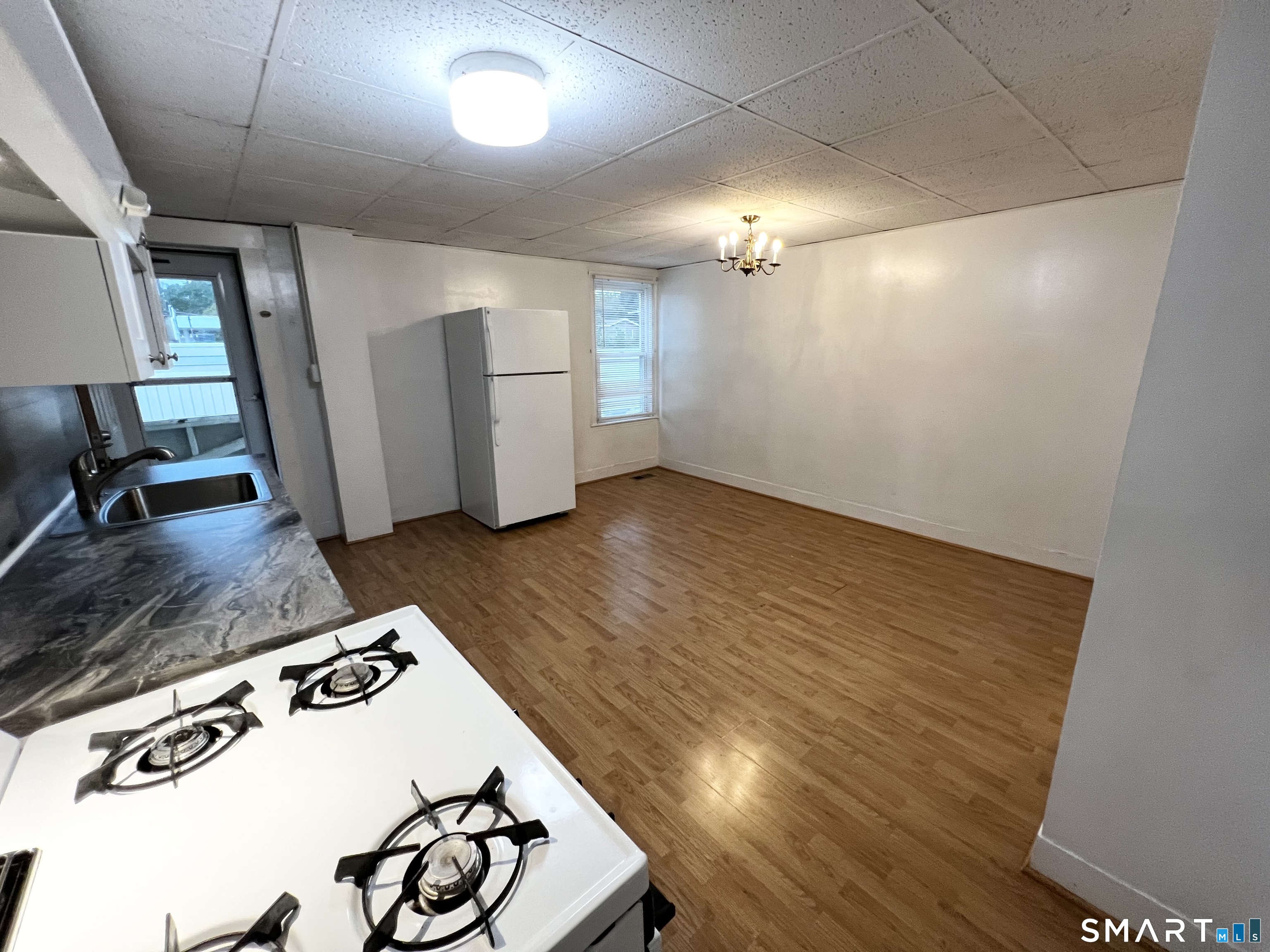 143 William Street, Unit A Middletown, CT 06457 - Photo 4 of 20 a view of a livingroom with furniture and wooden floor