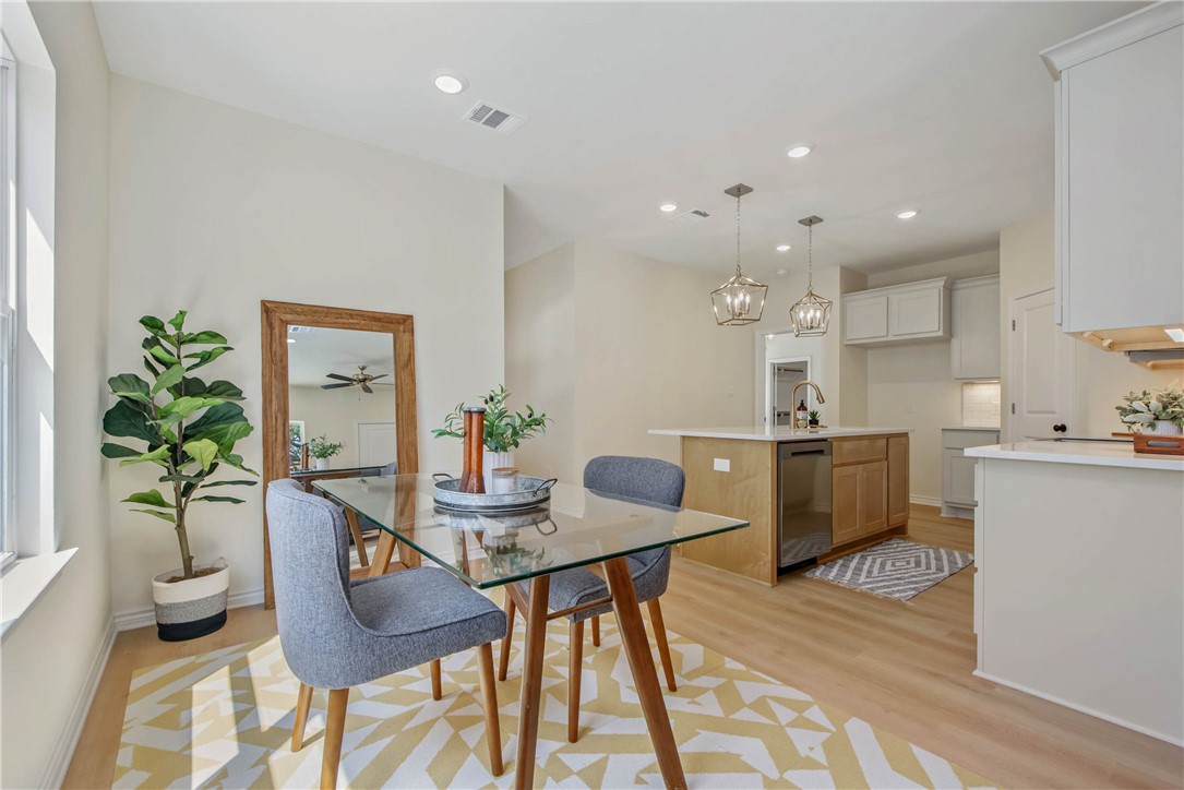 2006 Stevens Drive Bryan, TX 77803 - Photo 6 of 18 a kitchen with a table and chairs in it