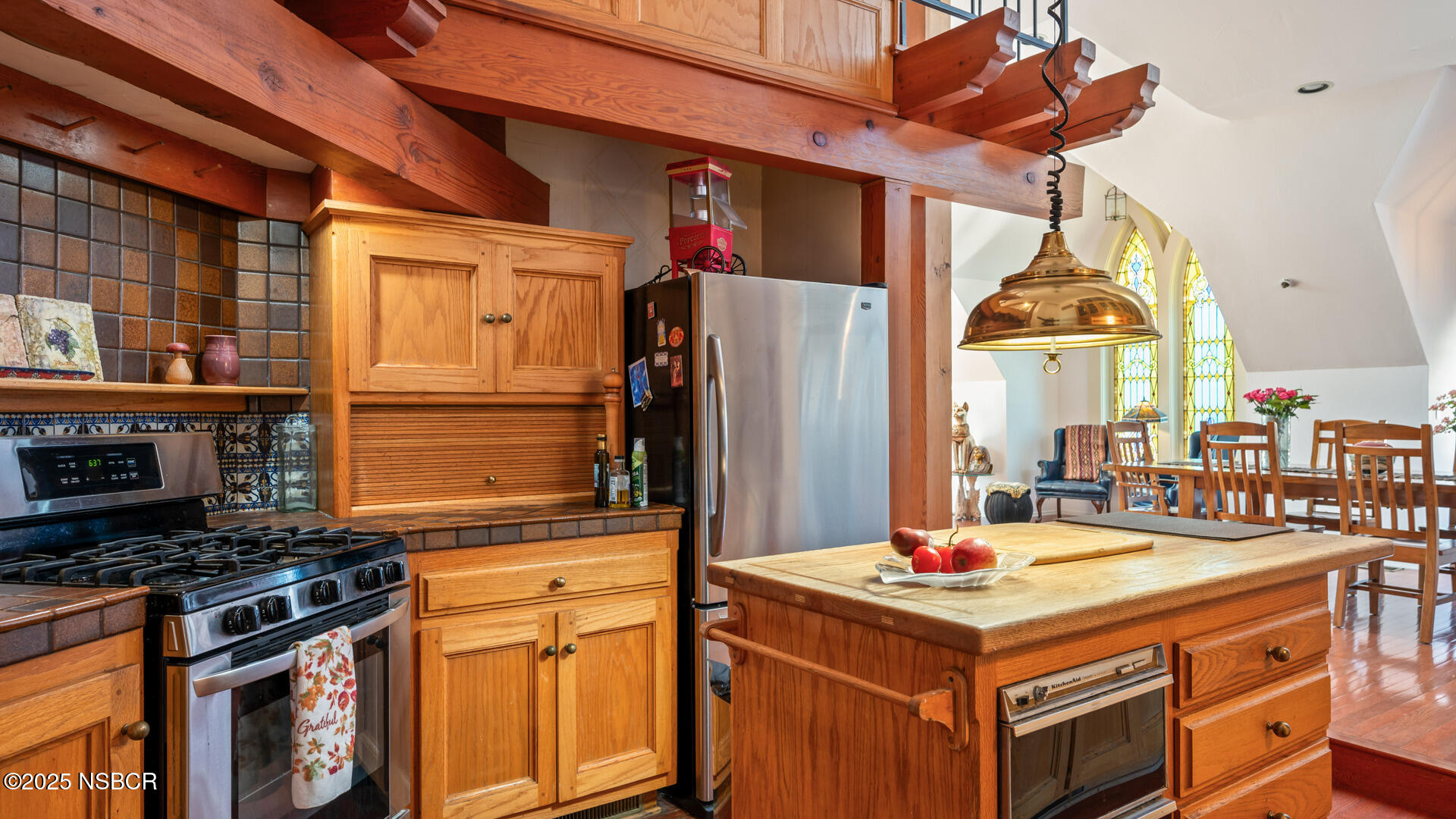 437 2nd Street Solvang, CA 93463 - Photo 19 of 39 a kitchen that has a stove and a refrigerator