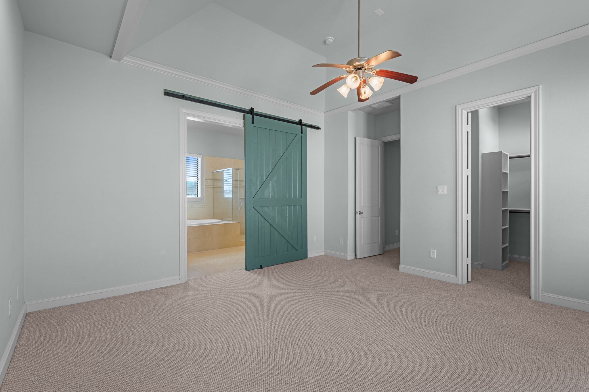 5617 Kiam Street, Unit A Houston, TX 77007 - Photo 16 of 21 Primary bedroom - Farm door installed! Located on the 3rd floor.