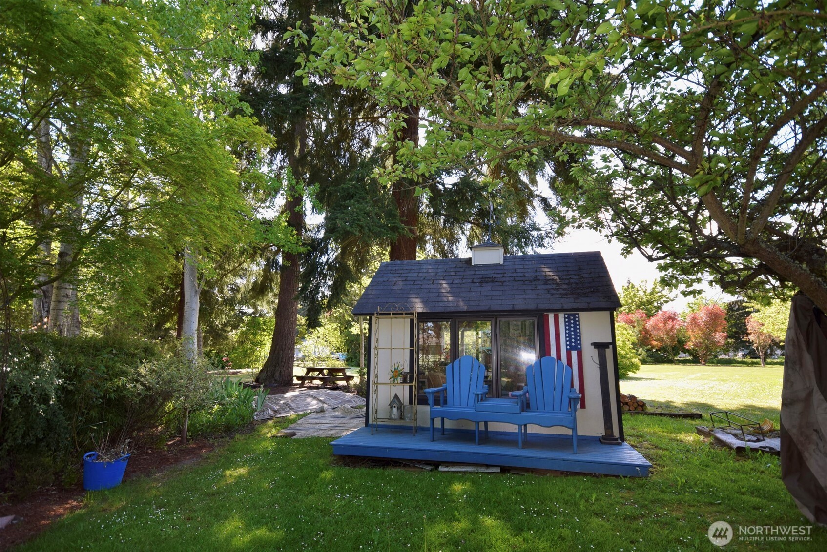 171 Foxtail Lane Sequim, WA 98382 - Photo 27 of 34 a view of house with a yard swing and a tree