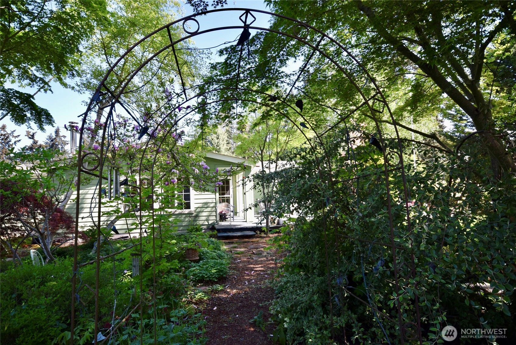 171 Foxtail Lane Sequim, WA 98382 - Photo 30 of 34 a view of a yard with plants and trees