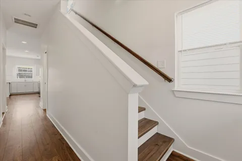 a view of entryway with wooden floor