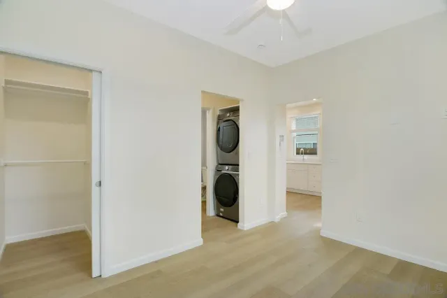 a bathroom with a shower and a bath tub