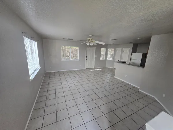 a view of an empty room and window