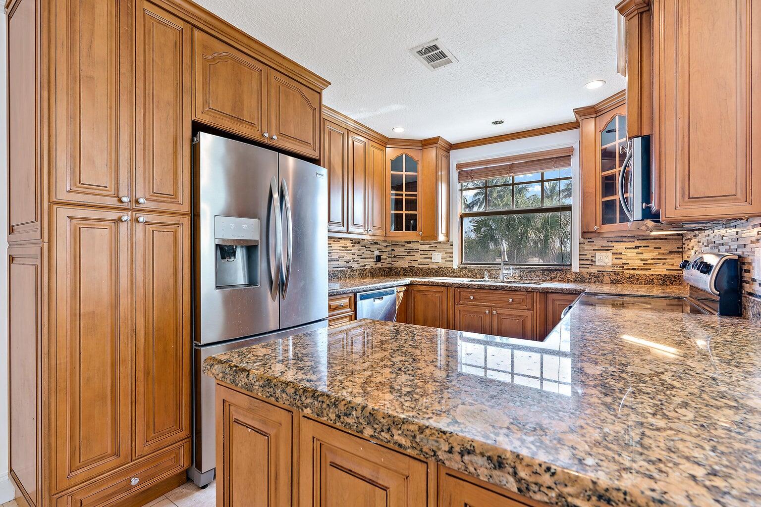 705 Mainsail Circle Jupiter, FL 33477 - Photo 4 of 20 kitchen with newer appliances