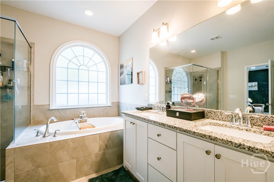 83 Spartina Way Midway, GA 31320 - Photo 13 of 50 Master bath
down