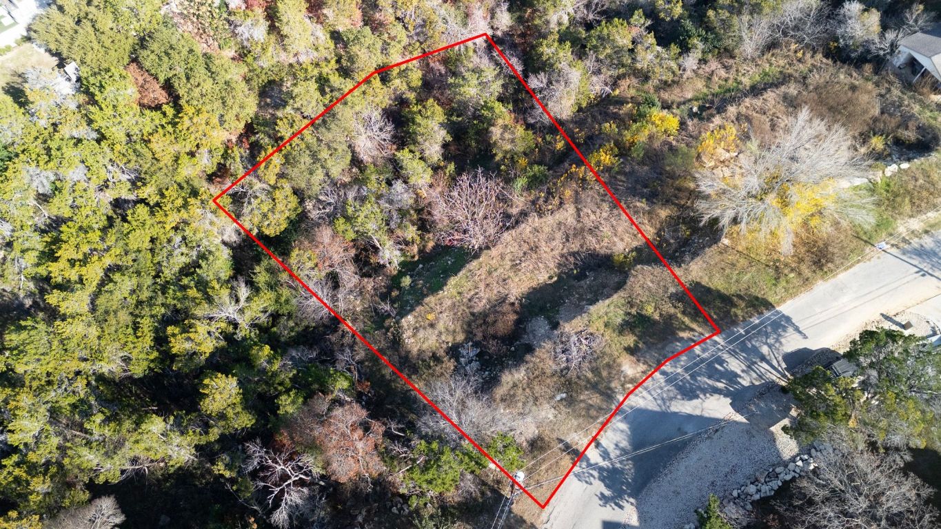 14506 Hunters Pass Austin, TX 78734 - Photo 13 of 19 a backyard of a house with a yard and outdoor seating