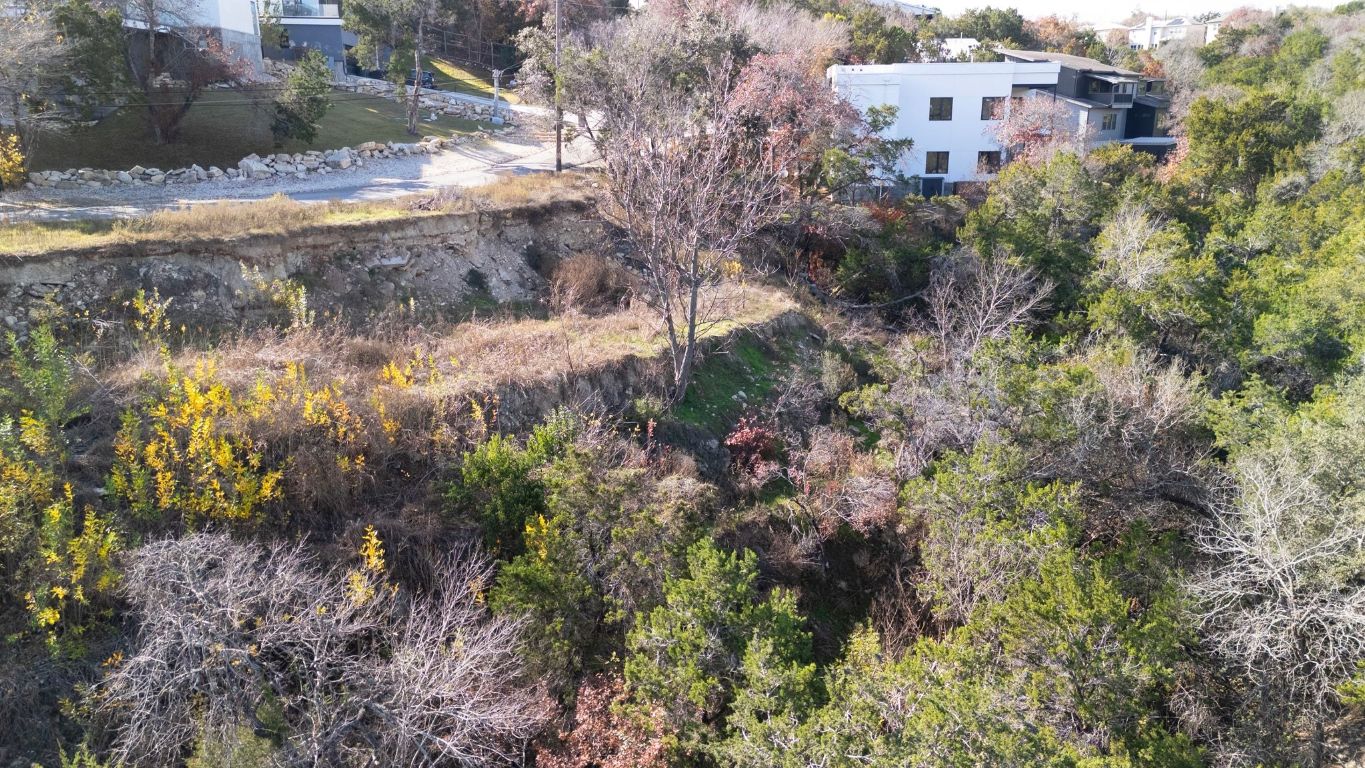 14506 Hunters Pass Austin, TX 78734 - Photo 14 of 19 a view of a house with a yard