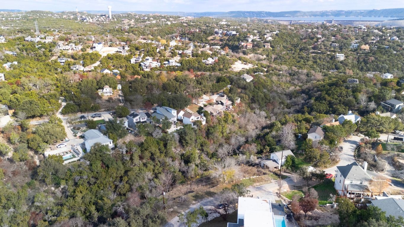 14506 Hunters Pass Austin, TX 78734 - Photo 4 of 19 an aerial view of residential houses with city view