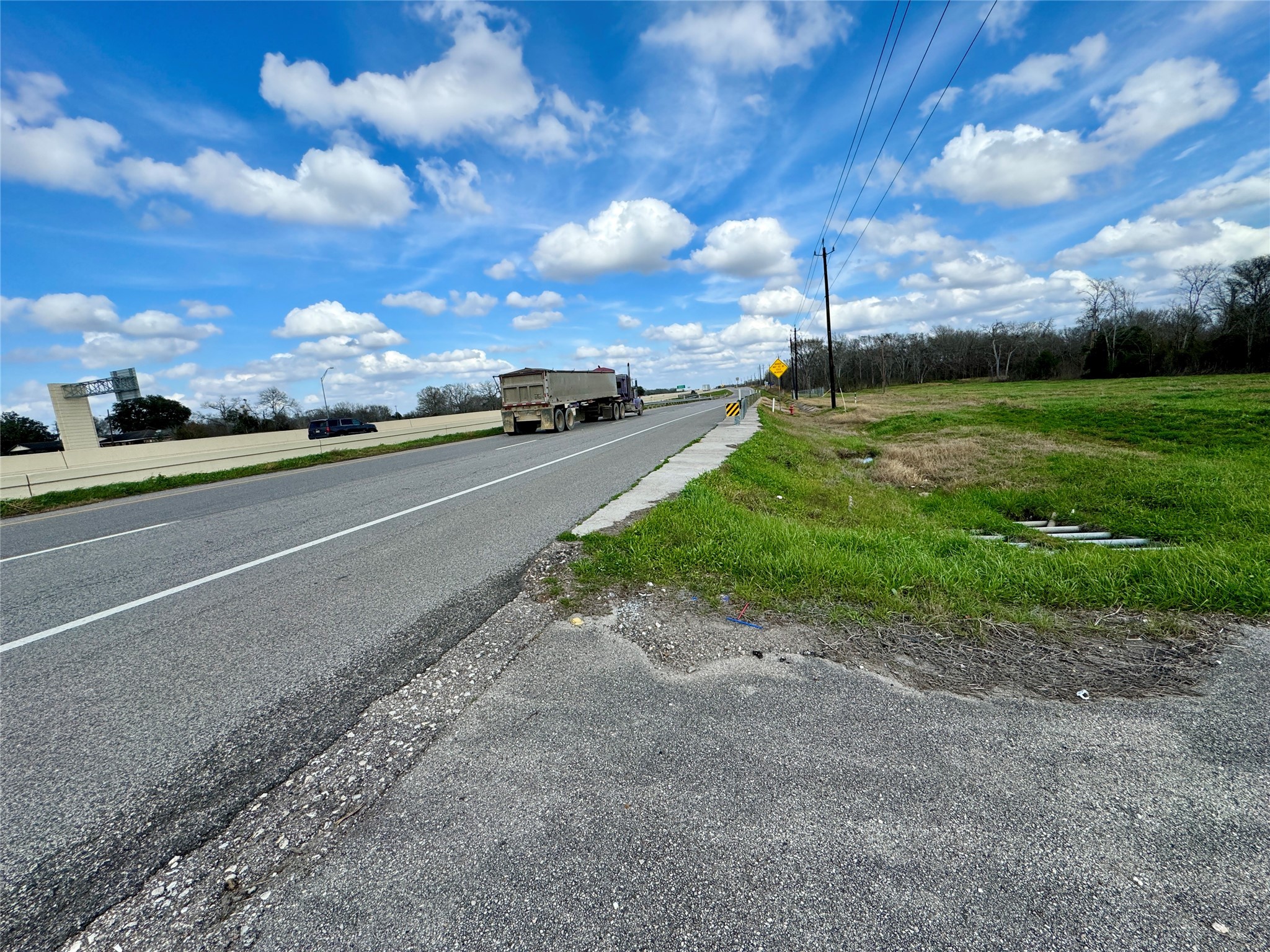 12425 Highway 59 Kendleton, TX 77417 - Photo 5 of 5 a view of a street with a building in the background