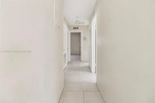 a bathroom with a sink a toilet and bathtub