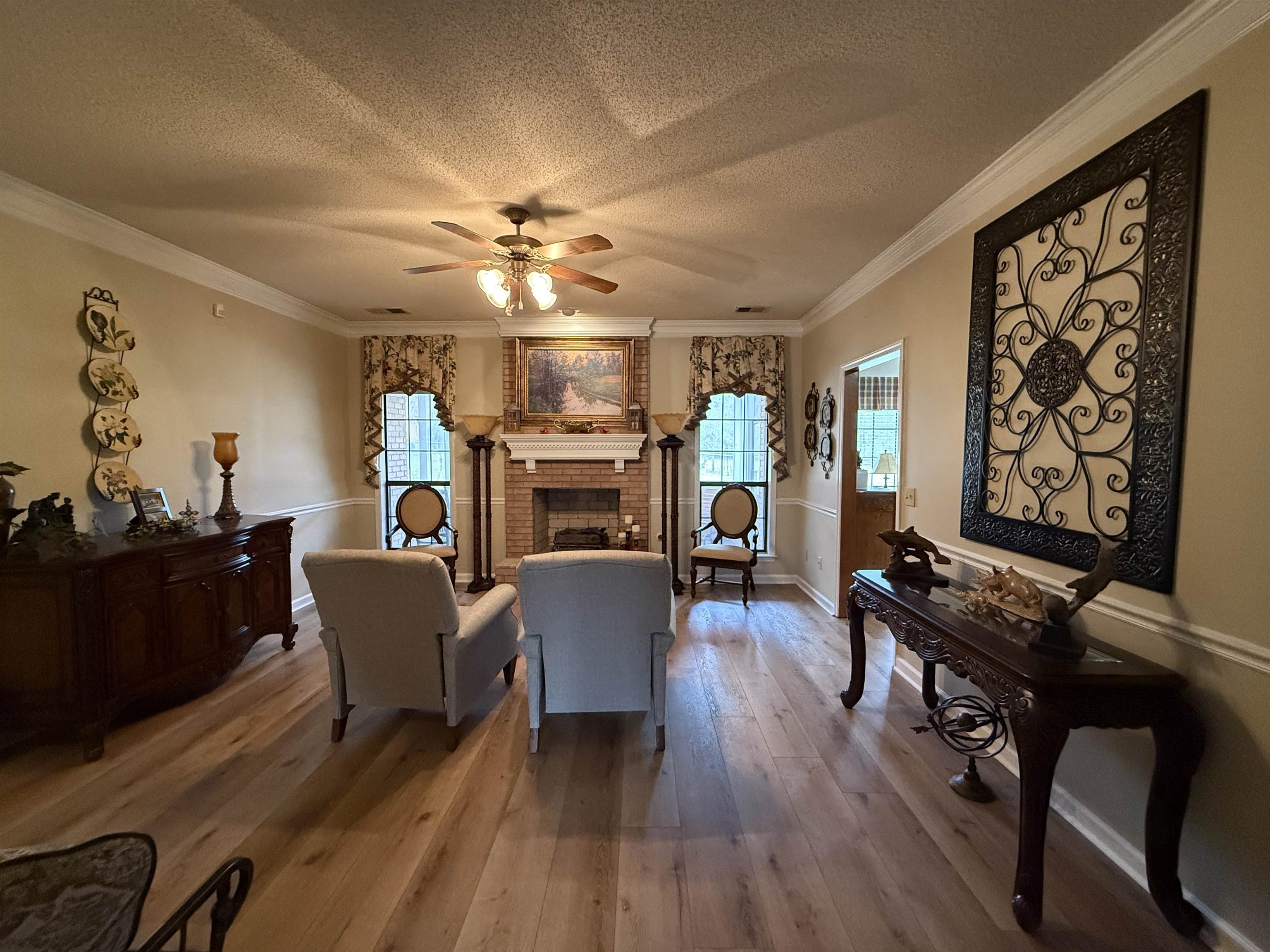 910 Highway 196 Piperton, TN 38017 - Photo 12 of 23 a living room with furniture and wooden floor
