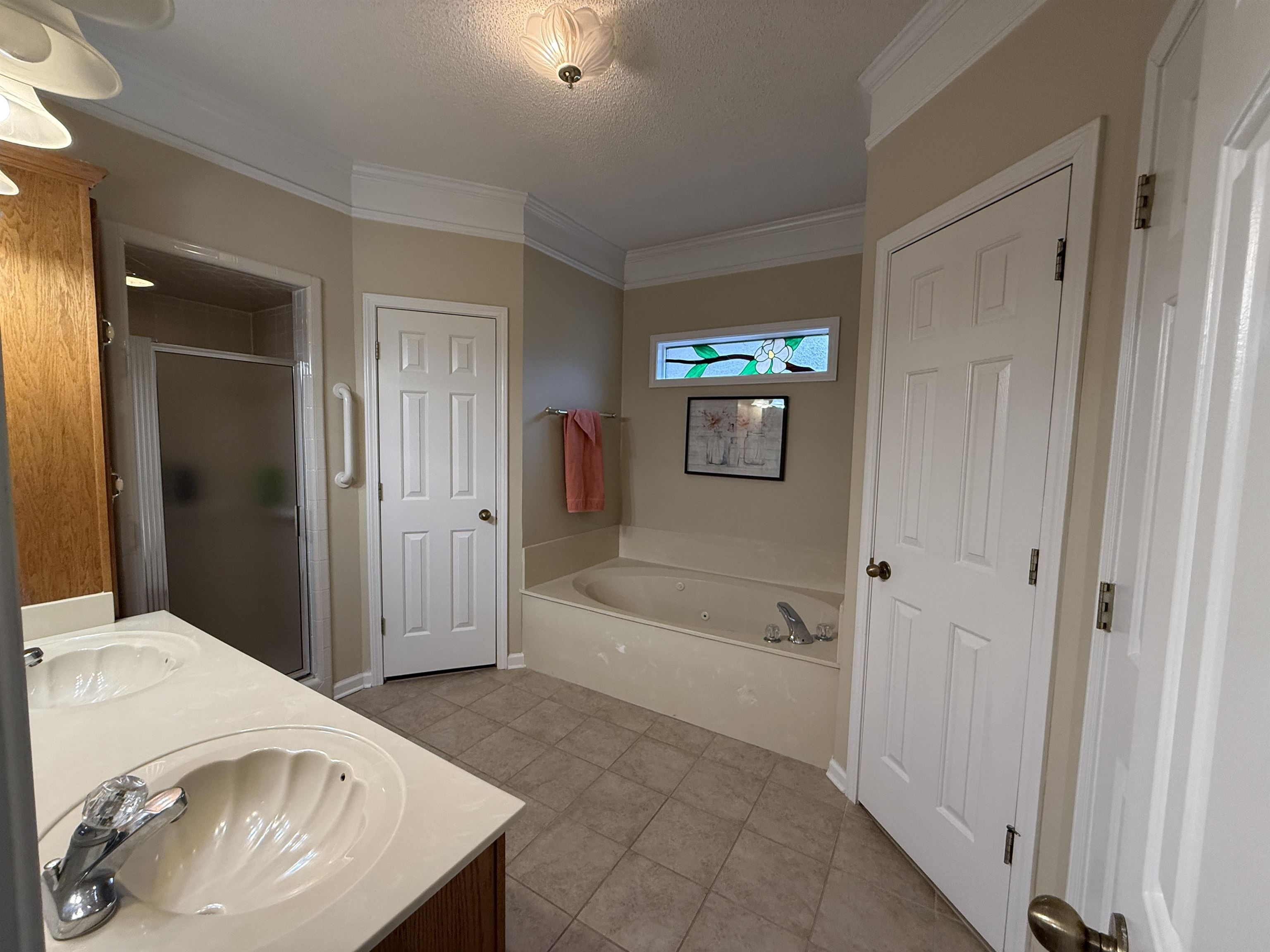 910 Highway 196 Piperton, TN 38017 - Photo 5 of 23 a bathroom with a bathtub and a sink