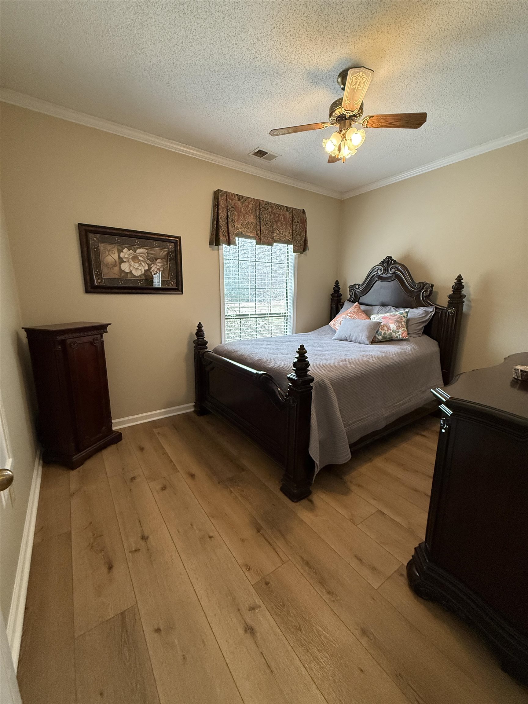 910 Highway 196 Piperton, TN 38017 - Photo 7 of 23 a bedroom with bed and window