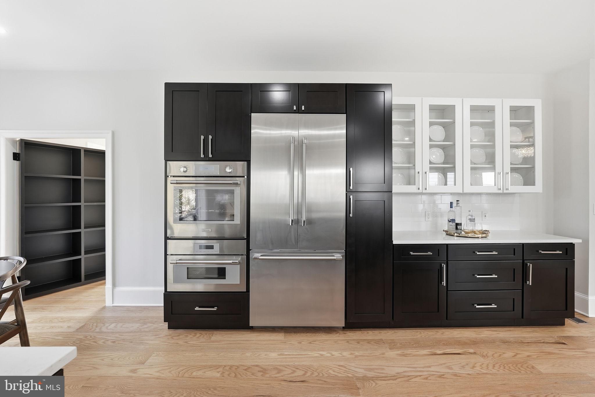 5315 Colorado Avenue Northwest Washington, DC 20011 - Photo 20 of 67 a kitchen with a refrigerator and cabinets