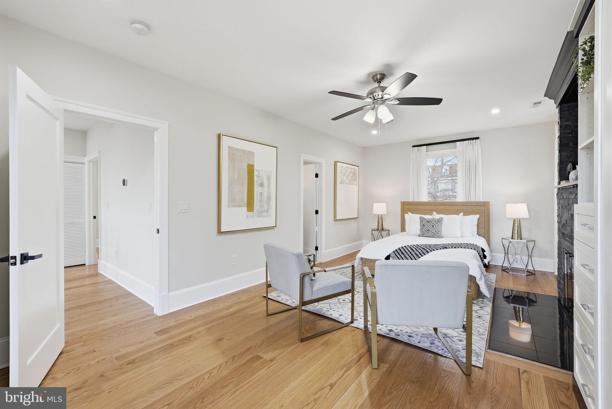 5315 Colorado Avenue Northwest Washington, DC 20011 - Photo 39 of 67 a bedroom with furniture and a chandelier fan