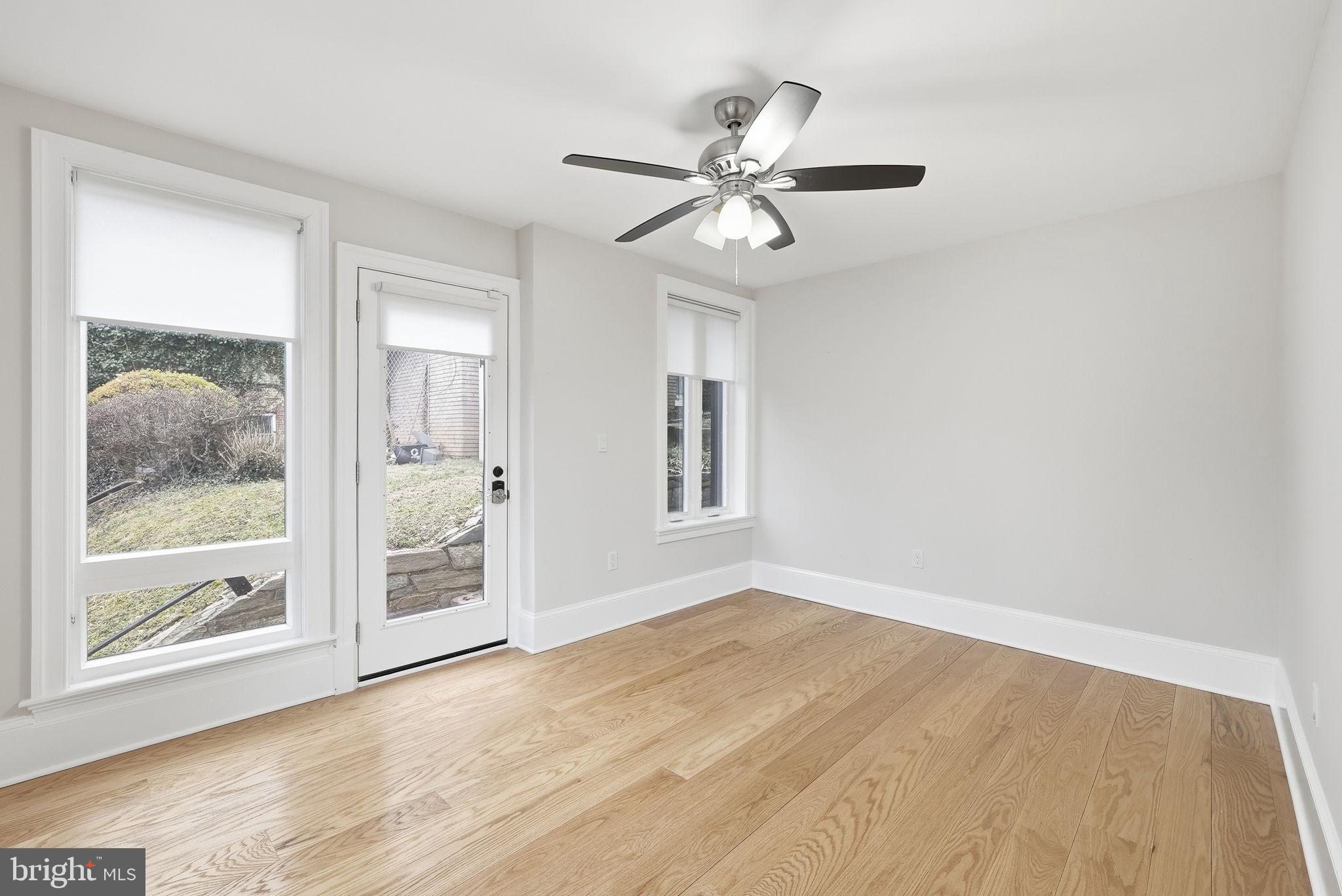 5315 Colorado Avenue Northwest Washington, DC 20011 - Photo 53 of 67 a view of a livingroom with a ceiling fan and window