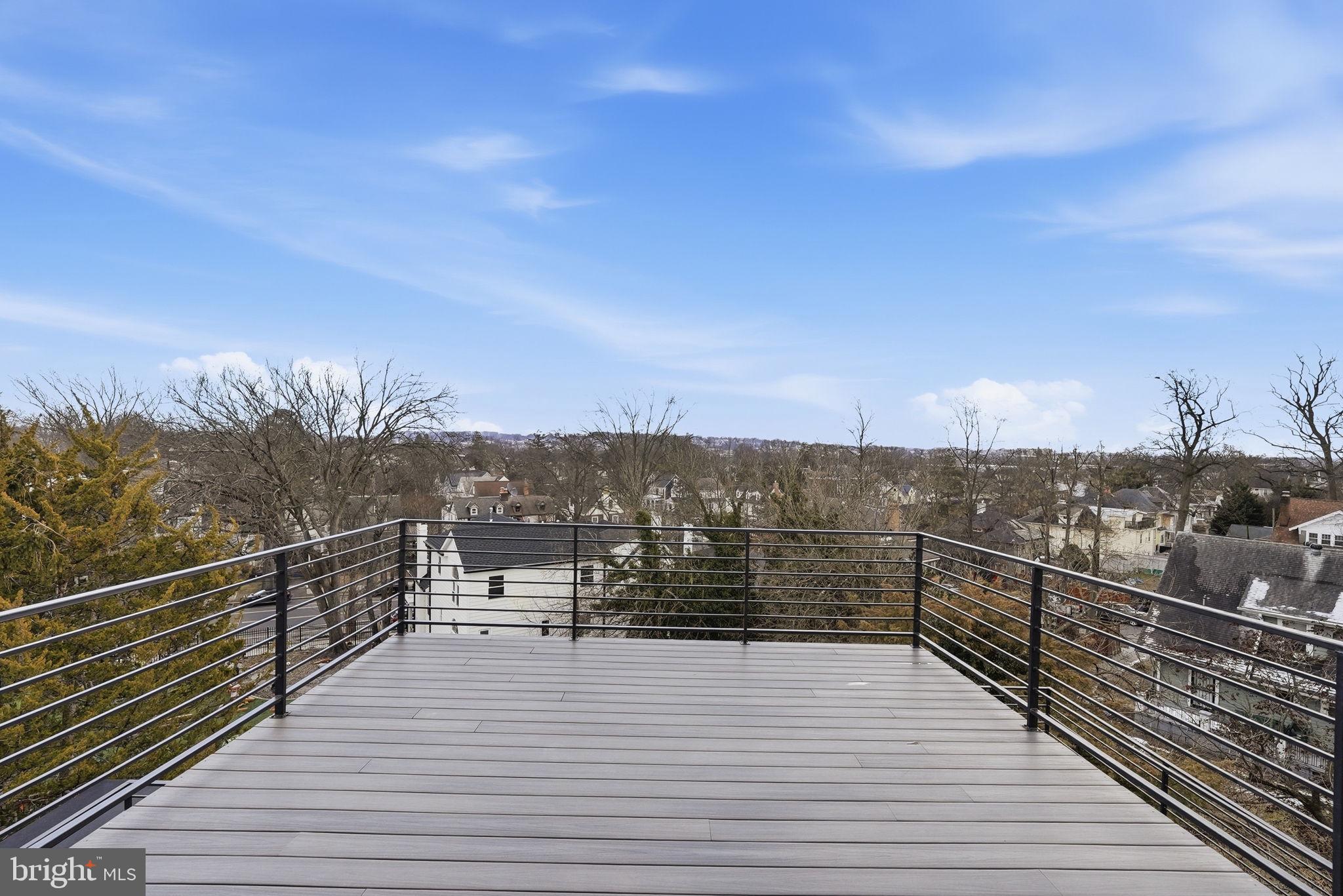 5315 Colorado Avenue Northwest Washington, DC 20011 - Photo 61 of 67 a view of a balcony with wooden floor and city view