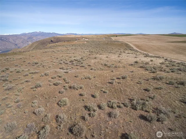 a view of ocean and mountain
