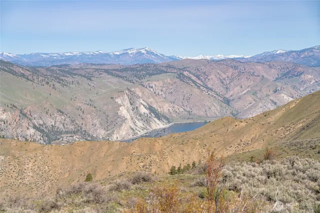a view of mountain view with mountains in the background