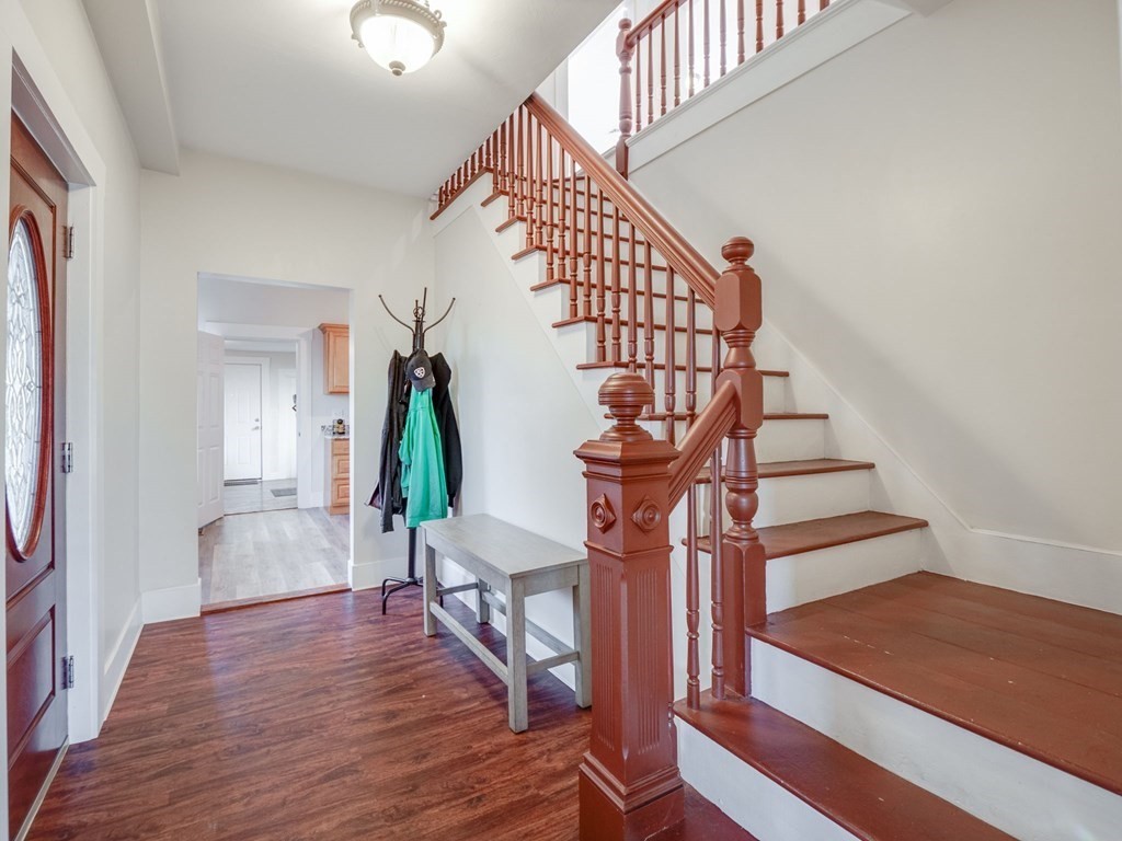 116 Middlesex Road Tyngsborough, MA 01879 - Photo 22 of 42 a view of entryway and hall with wooden floor