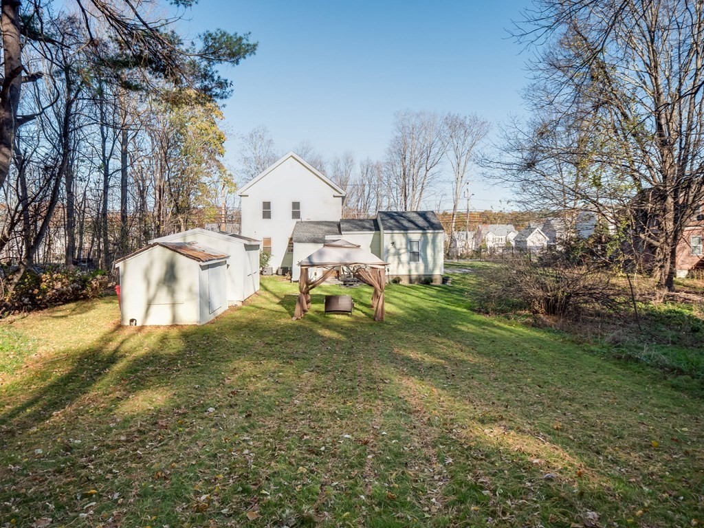 116 Middlesex Road Tyngsborough, MA 01879 - Photo 37 of 42 a view of a house with a yard