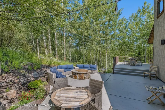 a outdoor living space with furniture and garden view