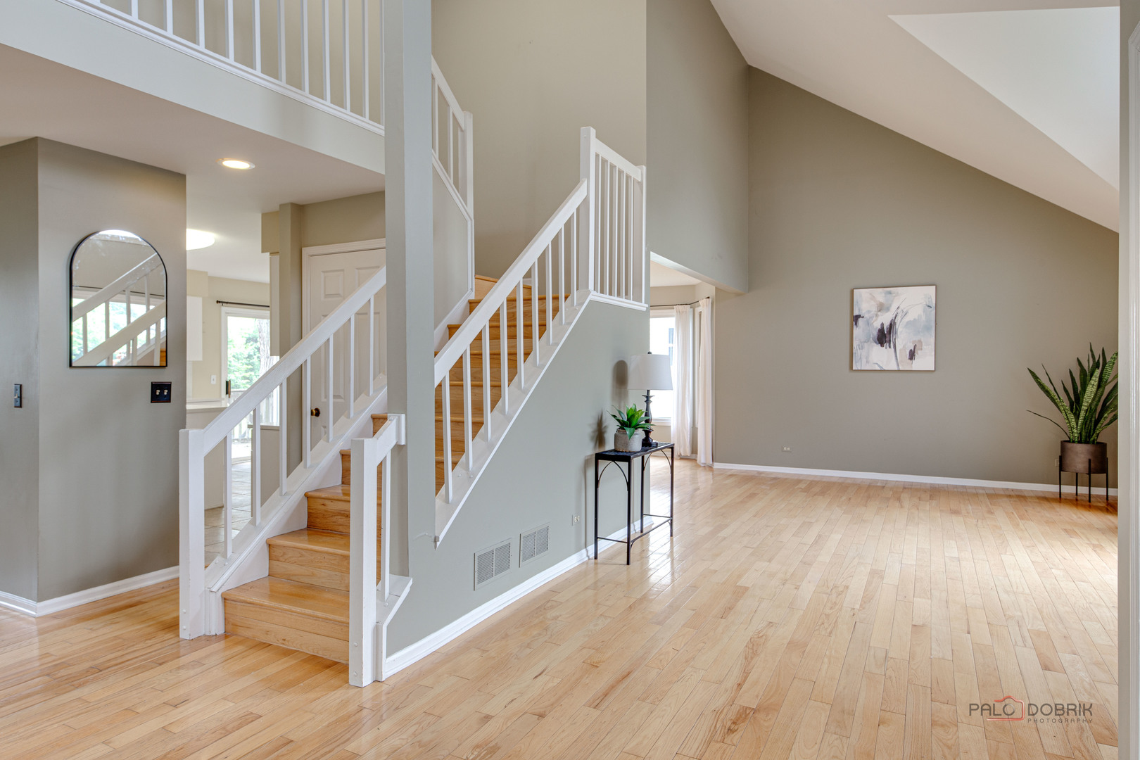 621 Raintree Road Buffalo Grove, IL 60089 - Photo 8 of 46 a view of entryway and hall with wooden floor