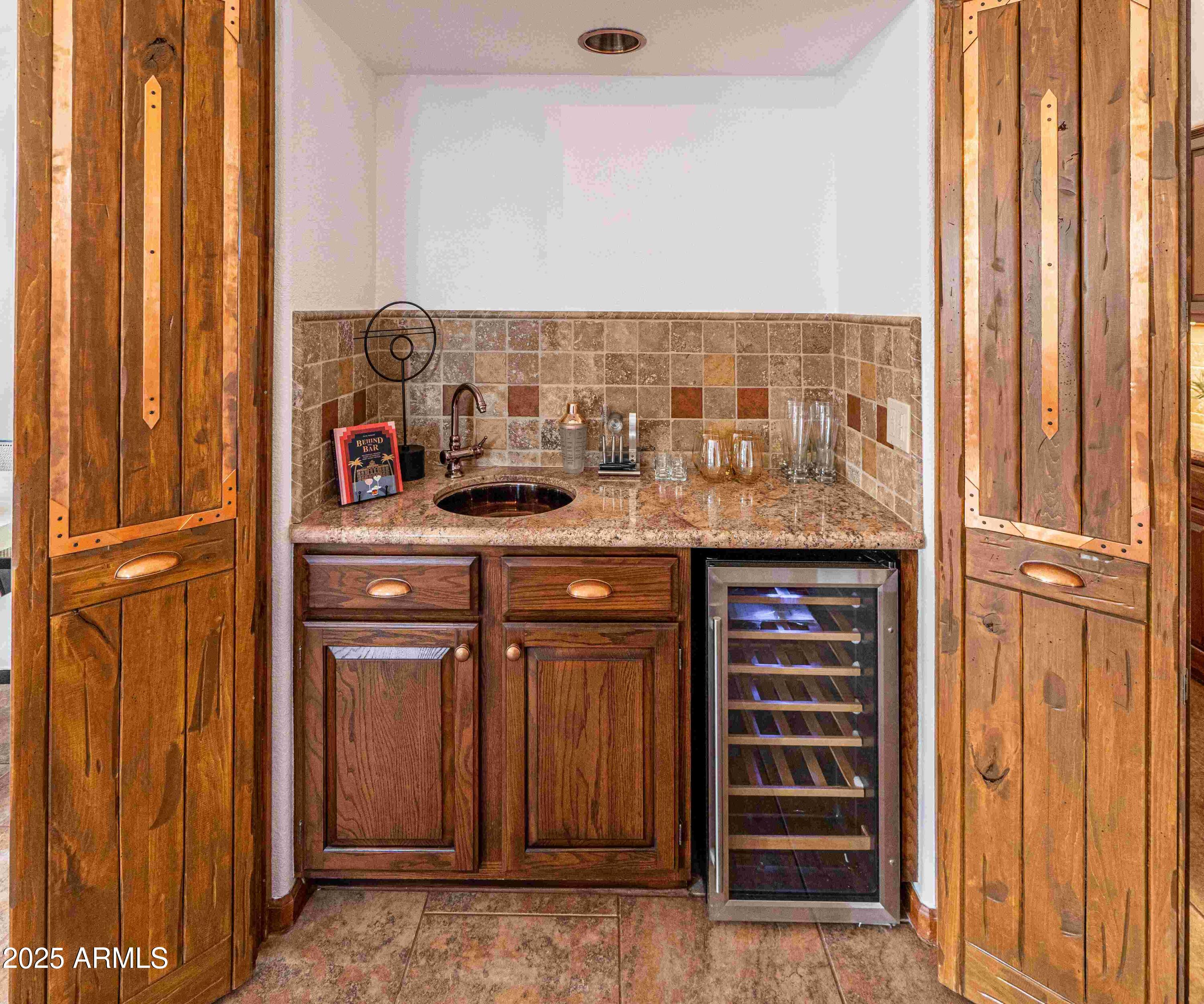 5426 East Libby Street Scottsdale, AZ 85254 - Photo 12 of 29 a view of kitchen with stainless steel appliances granite countertop and a sink