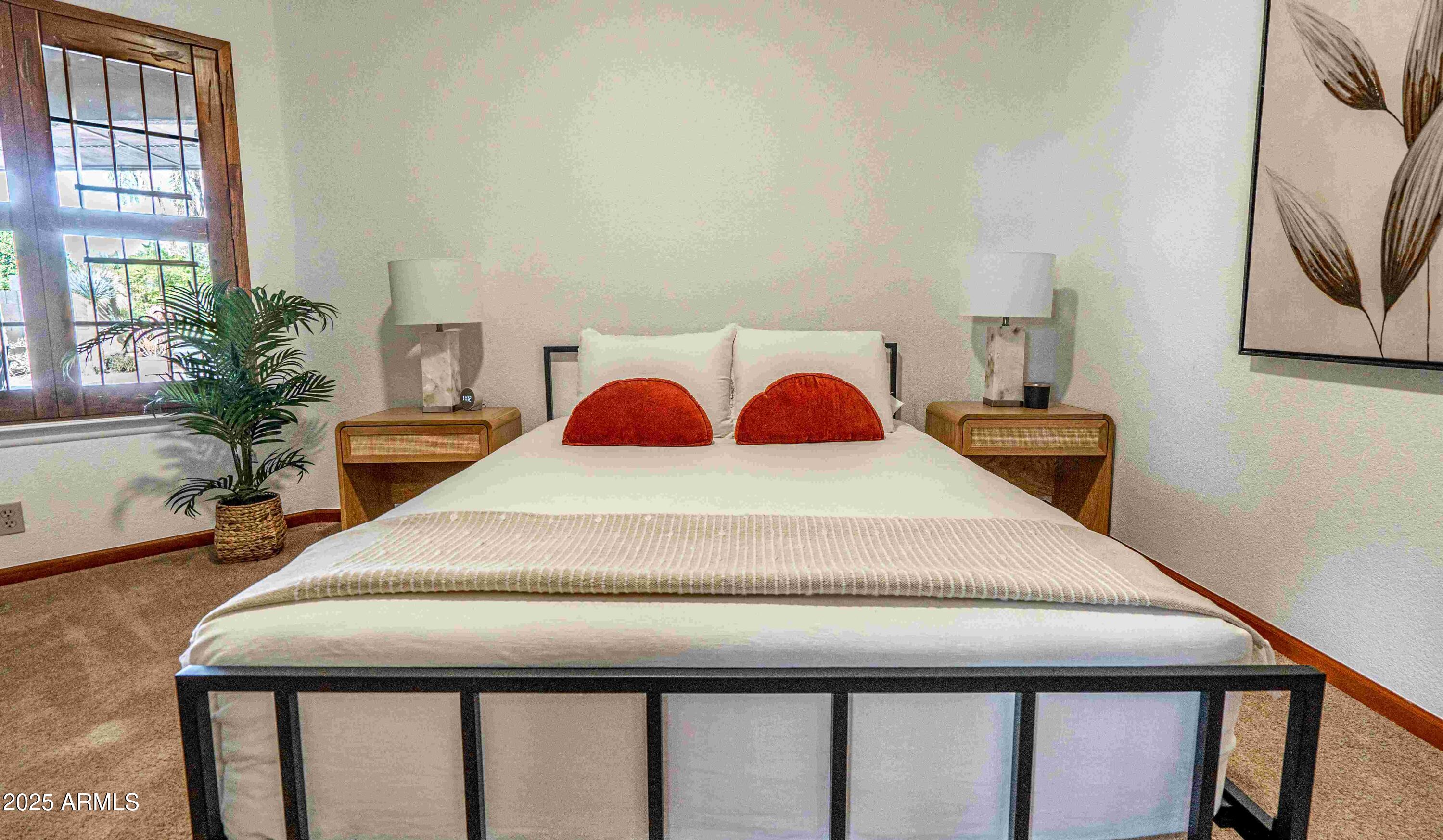 5426 East Libby Street Scottsdale, AZ 85254 - Photo 20 of 29 a bedroom with a bed and dresser