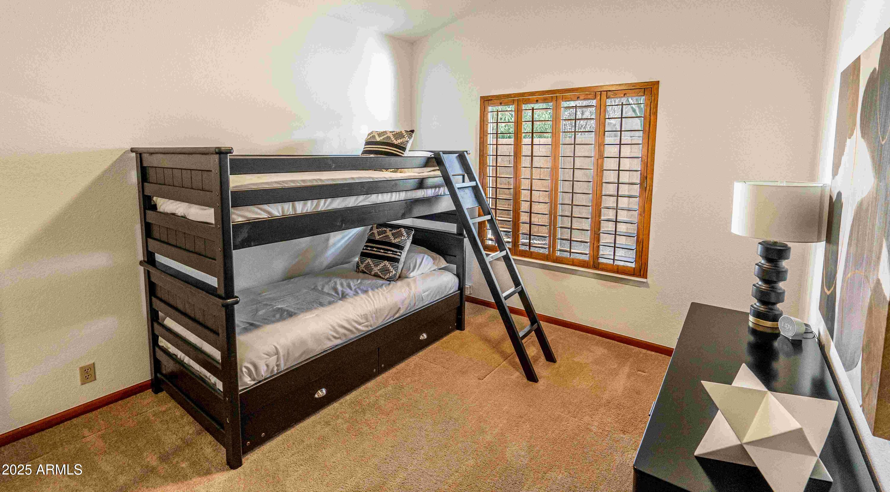 5426 East Libby Street Scottsdale, AZ 85254 - Photo 23 of 29 a bedroom with furniture and a window