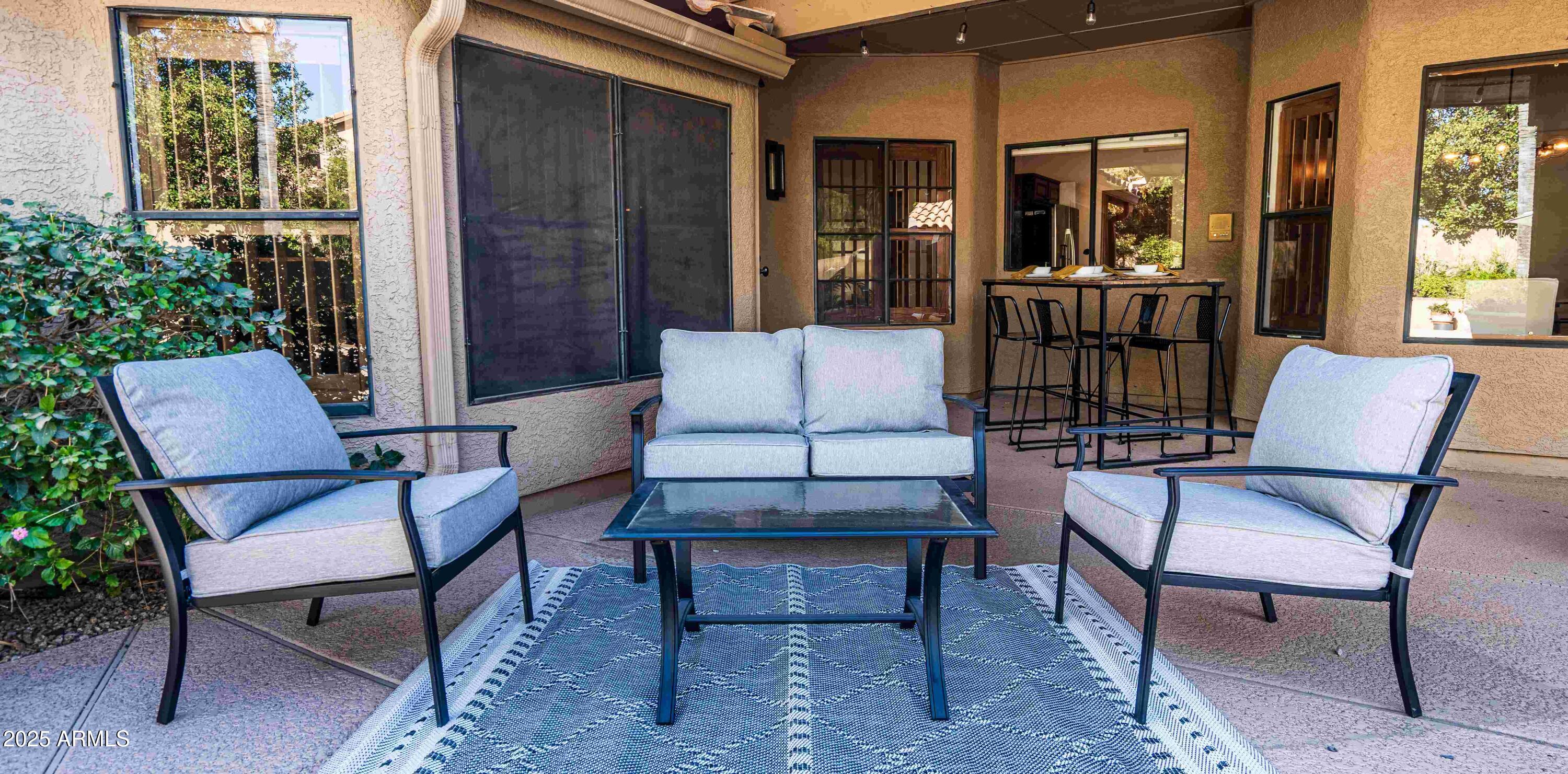 5426 East Libby Street Scottsdale, AZ 85254 - Photo 27 of 29 a outdoor living room with furniture