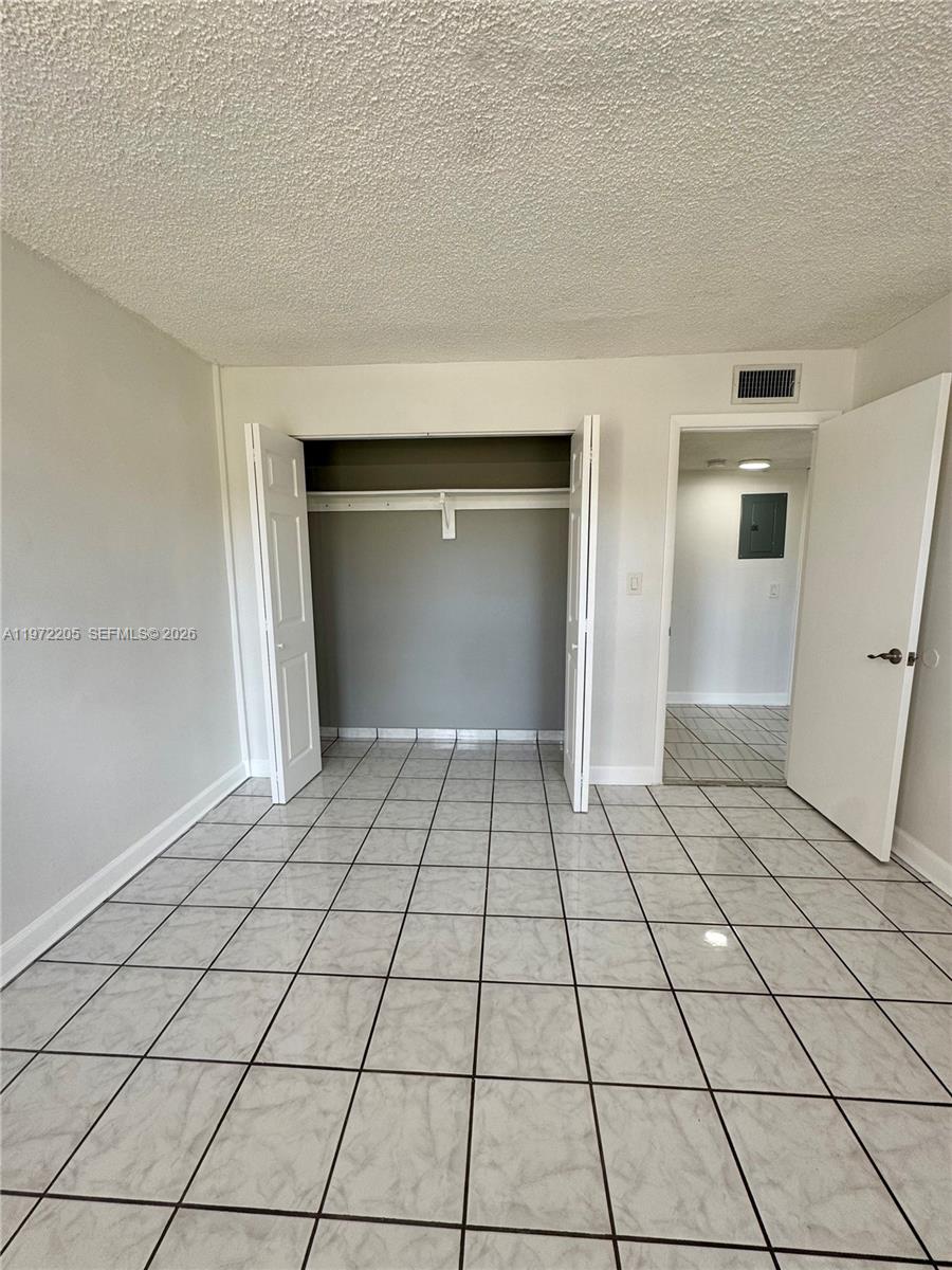 13700 Southwest 62nd Street, Unit 113 Miami, FL 33183 - Photo 11 of 30 Guest bedroom 1 closet