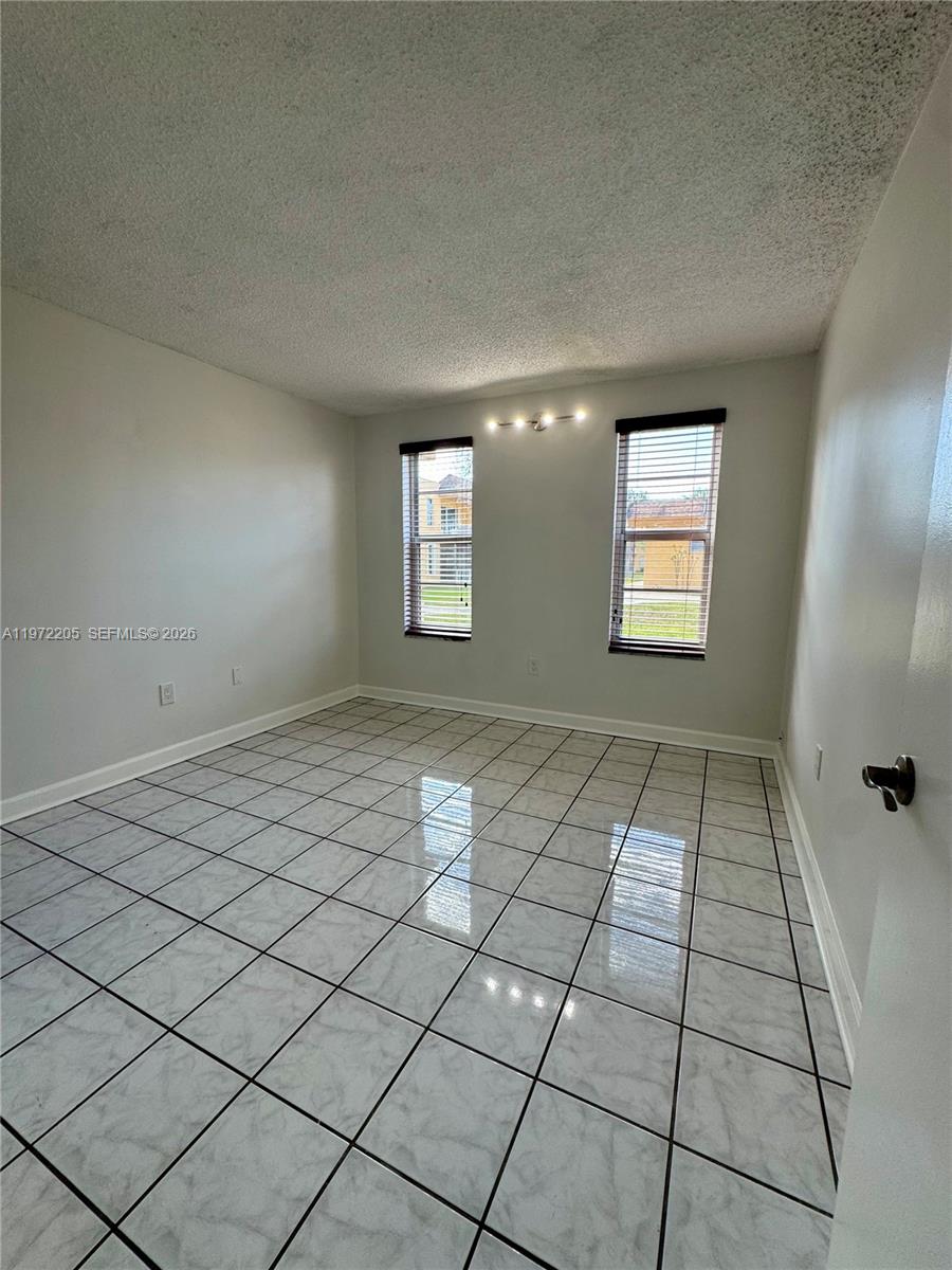 13700 Southwest 62nd Street, Unit 113 Miami, FL 33183 - Photo 14 of 30 Guest bedroom 2