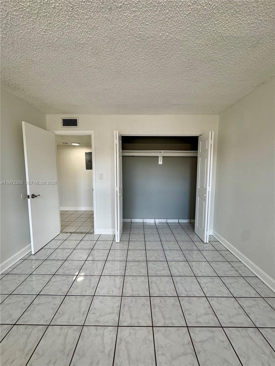 13700 Southwest 62nd Street, Unit 113 Miami, FL 33183 - Photo 15 of 30 Guest bedroom 2 closet