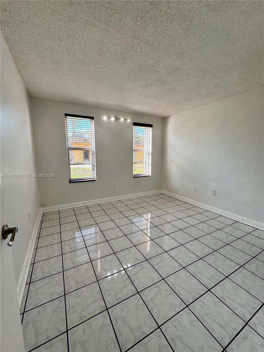 13700 Southwest 62nd Street, Unit 113 Miami, FL 33183 - Photo 10 of 30 Guest bedroom 1