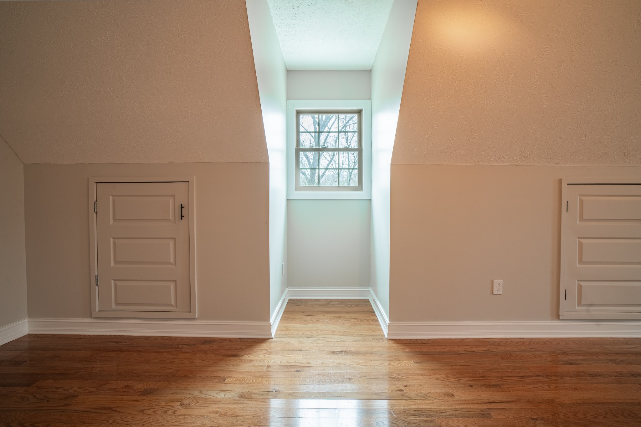 550 Laurel Crown Road Manchester, TN 37355 - Photo 83 of 87 an empty room with wooden floor cabinet and windows