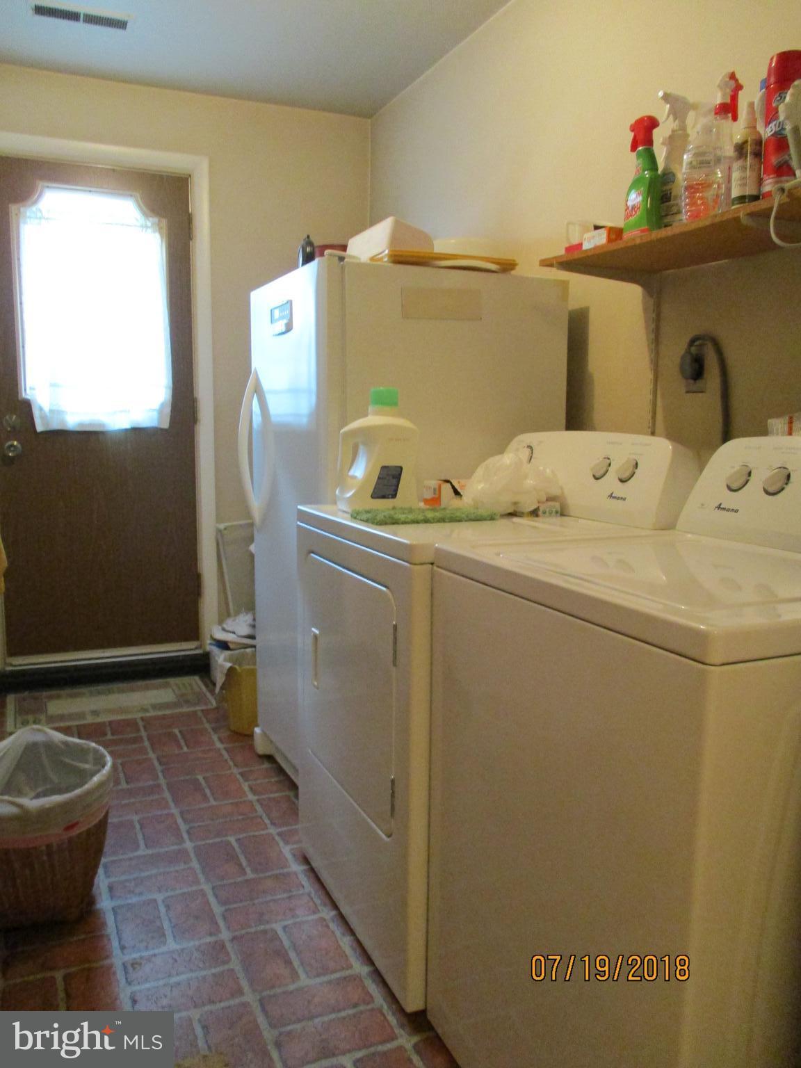 1781 Sapphire Road York, PA 17408 - Photo 16 of 38 Laundry with sink, garage & side yard access