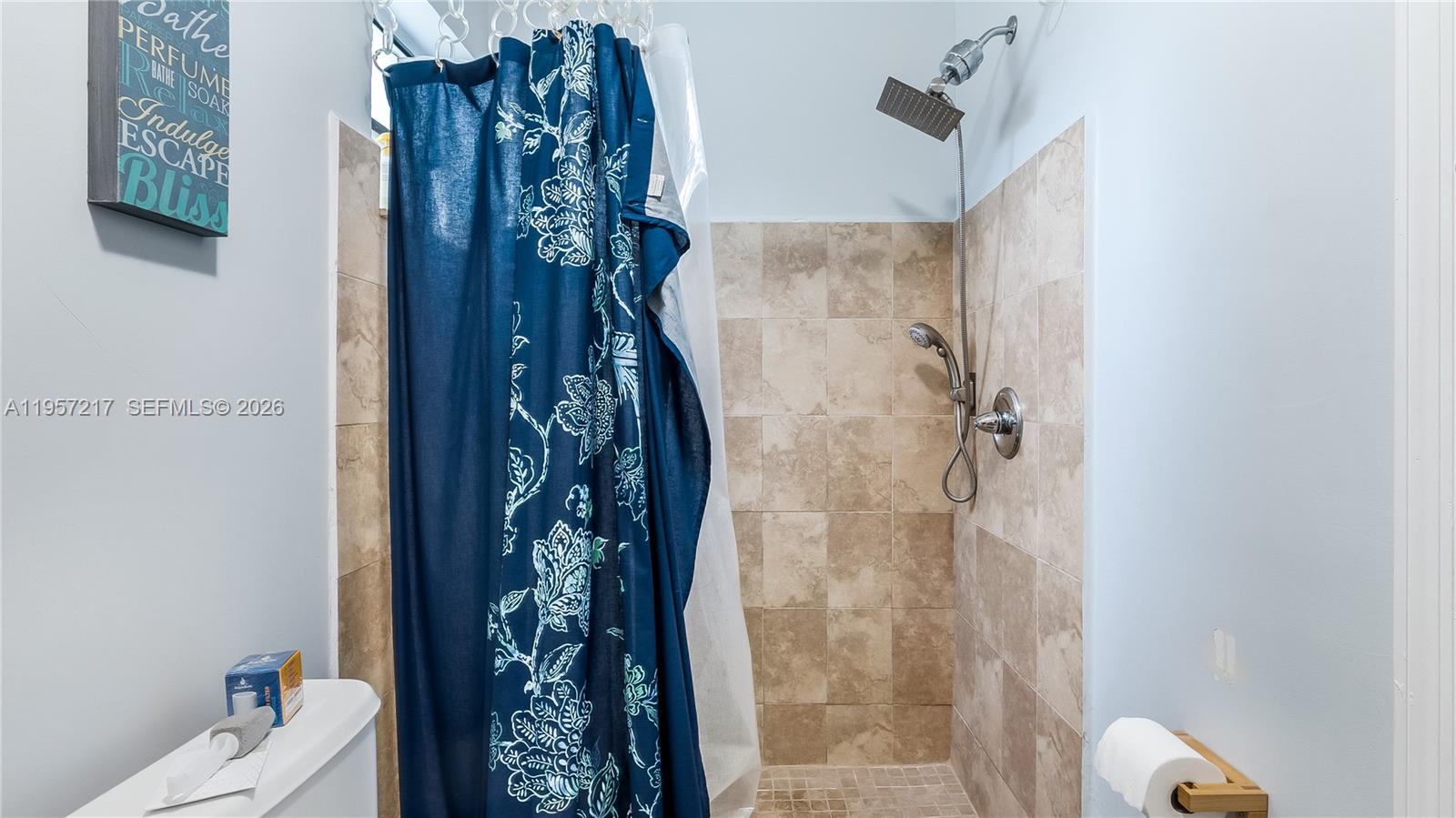 491 Northwest 108th Terrace Miami, FL 33168 - Photo 21 of 37 a bathroom with a shower