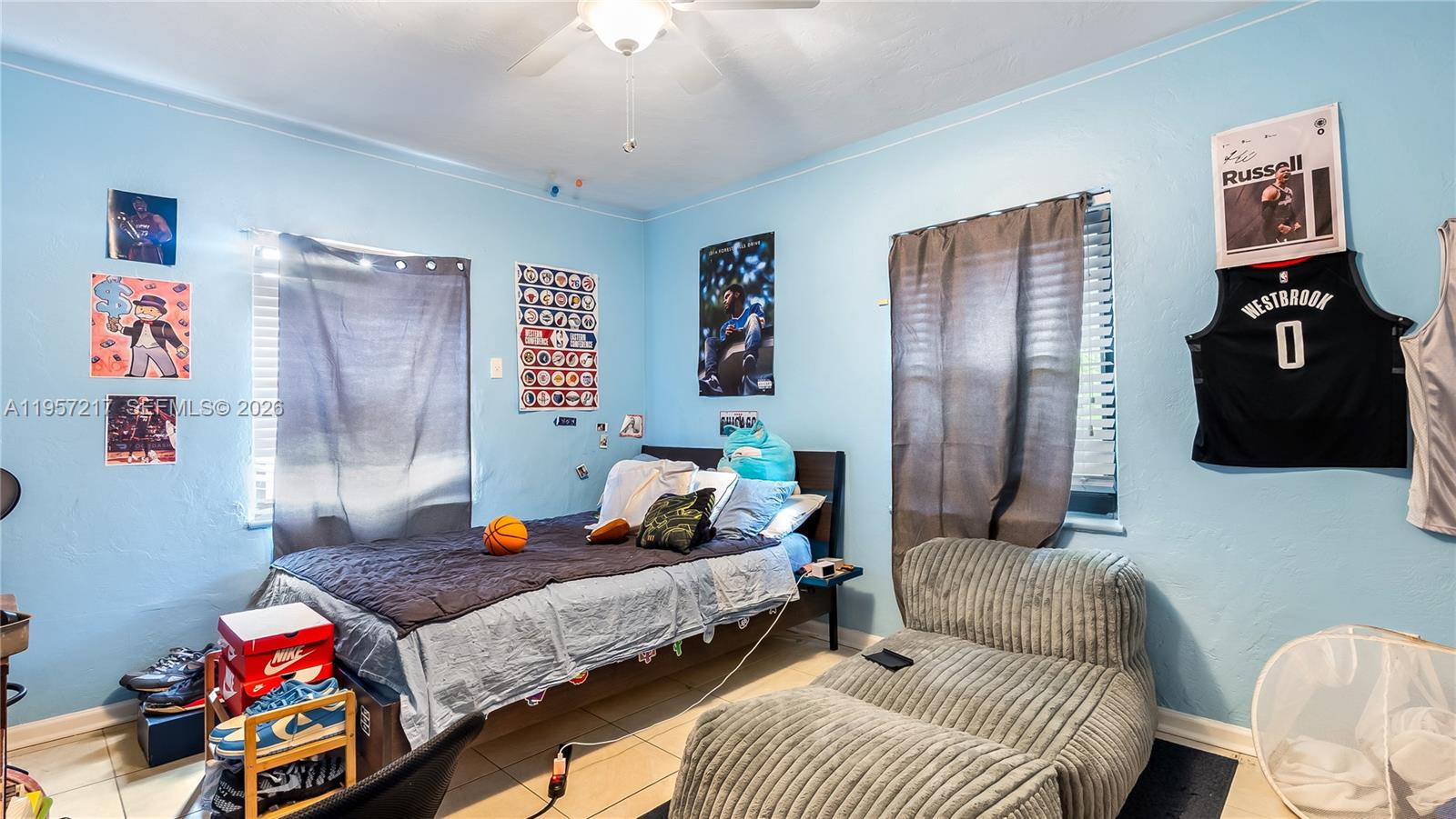 491 Northwest 108th Terrace Miami, FL 33168 - Photo 25 of 37 a bedroom with a bed and furniture