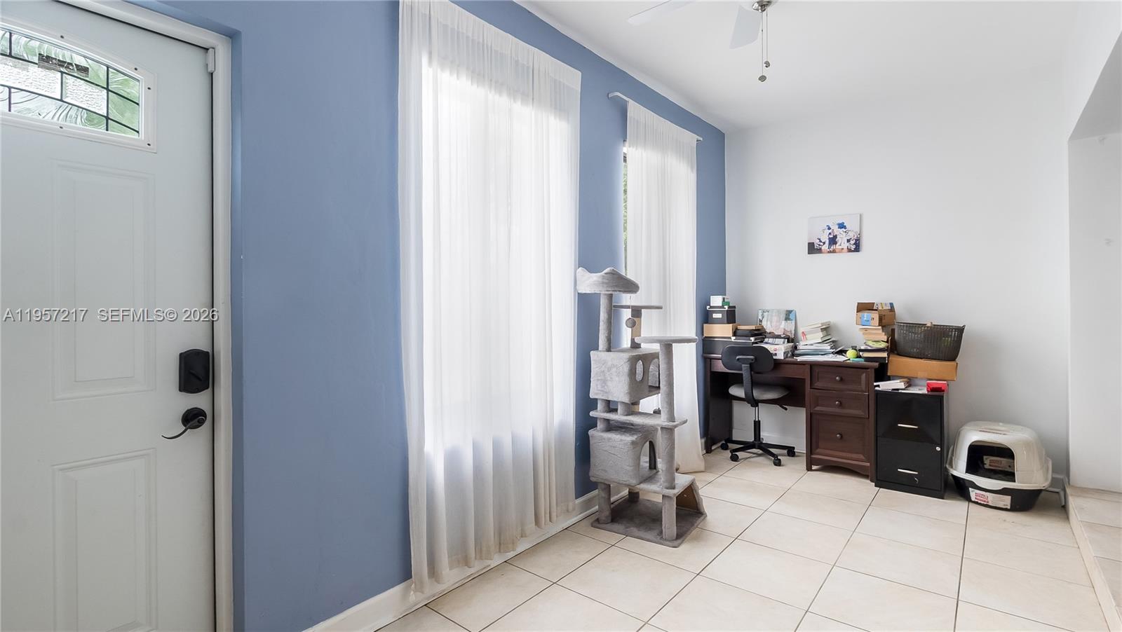 491 Northwest 108th Terrace Miami, FL 33168 - Photo 4 of 37 a view of workspace with windows