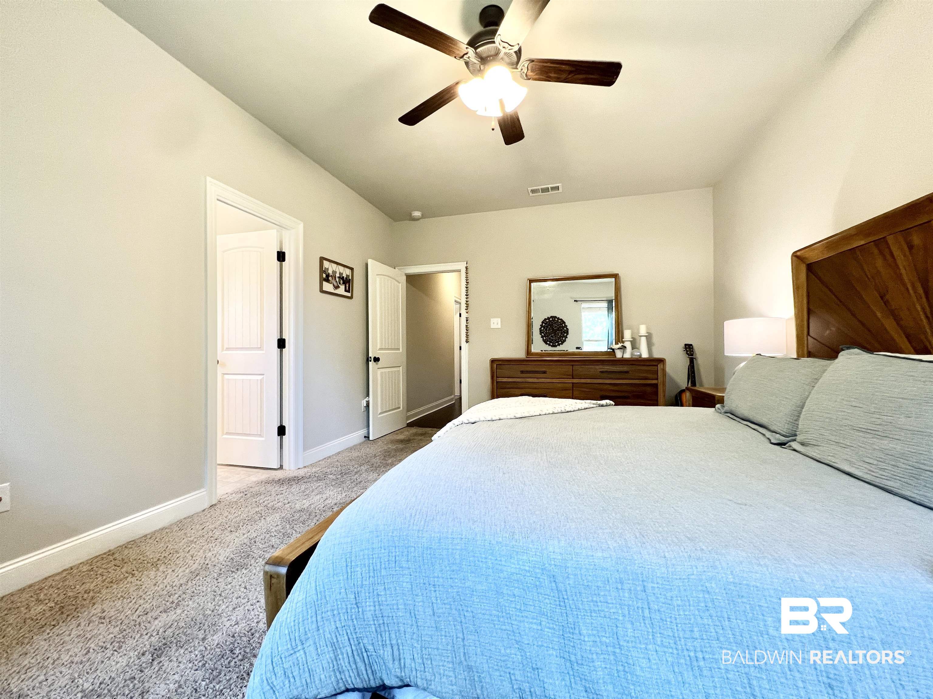 32290 Calder Court Daphne, AL 36527 - Photo 41 of 59 Bedroom featuring carpet floors and ceiling fan
