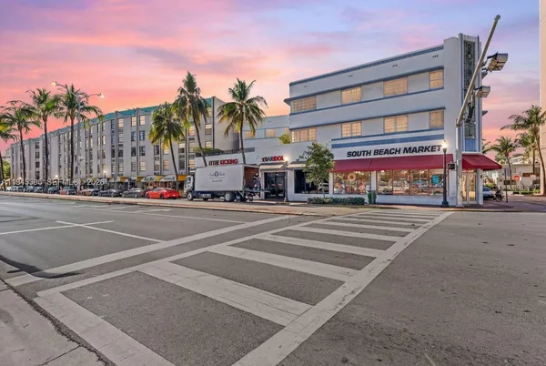 a building with a street next to a road
