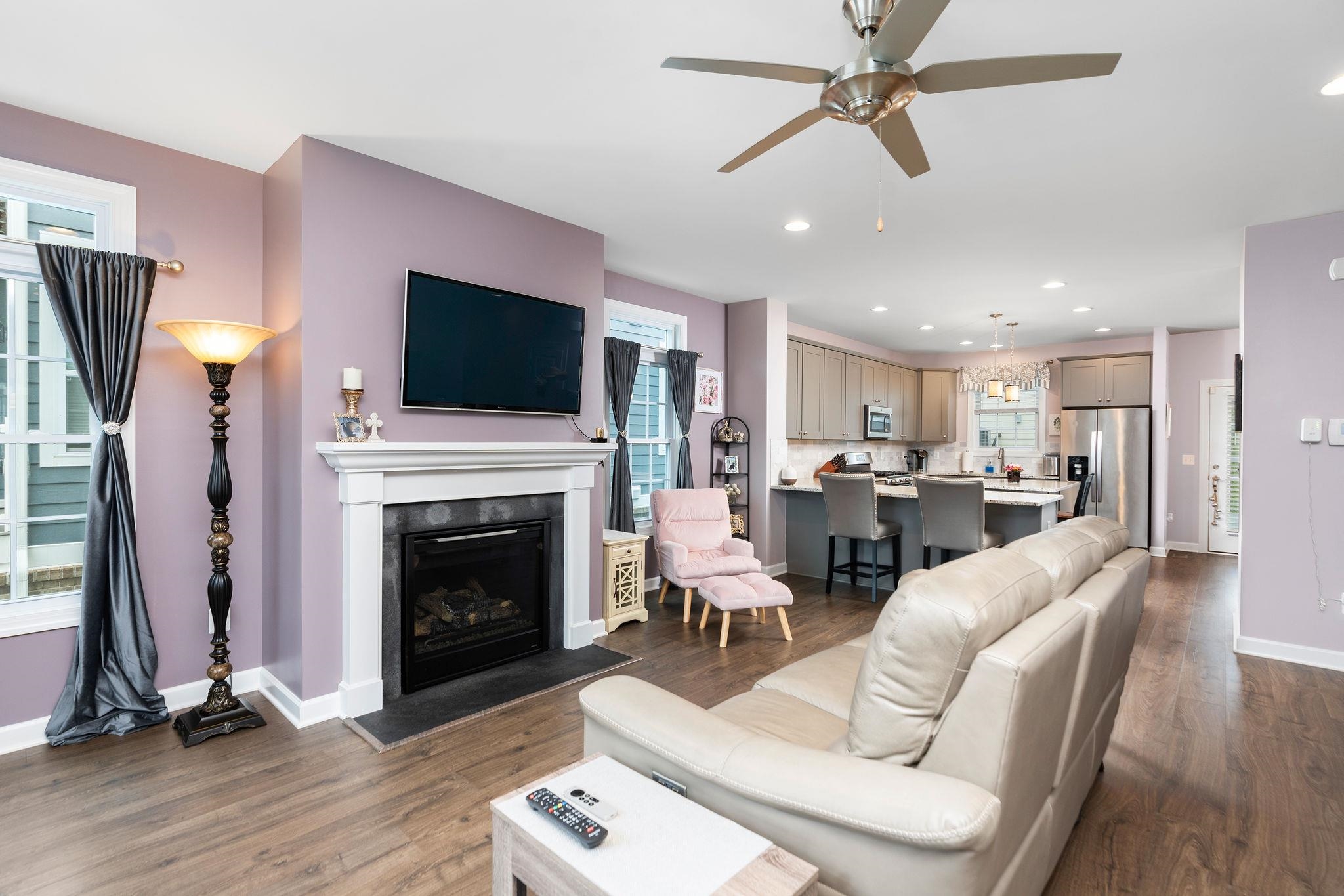 1644 Delphi Drive Charlottesville, VA 22911 - Photo 18 of 39 a living room with furniture a fireplace and a flat screen tv